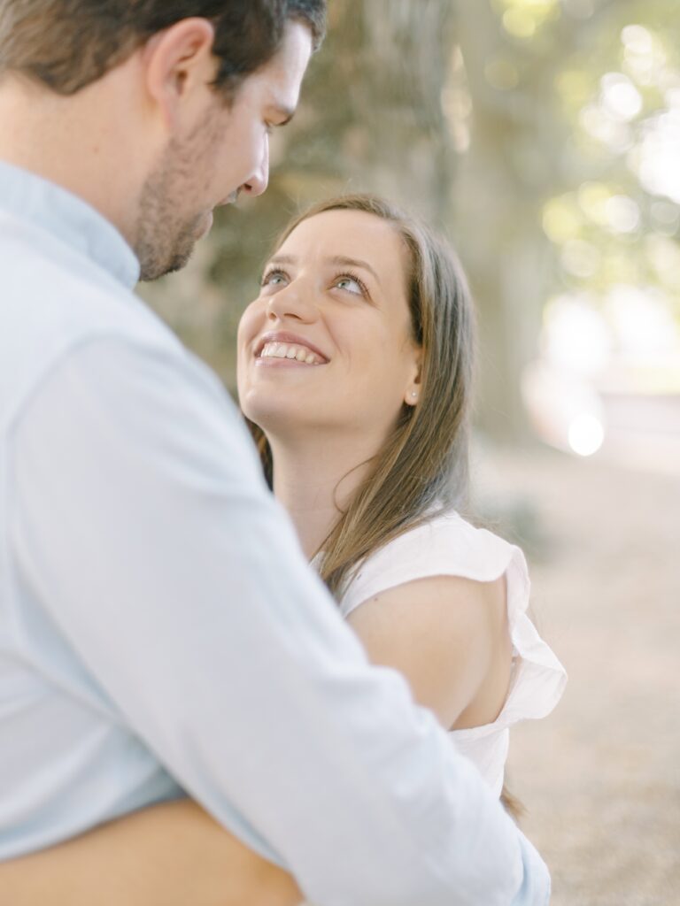 Switzerland engagement photographer capturing authentic emotions in a peaceful garden setting