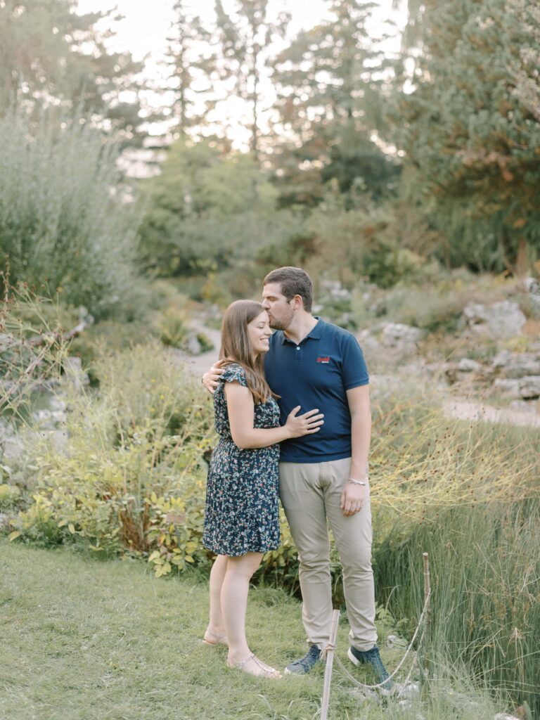 Switzerland engagement photographer capturing a couple in Geneva’s botanical garden