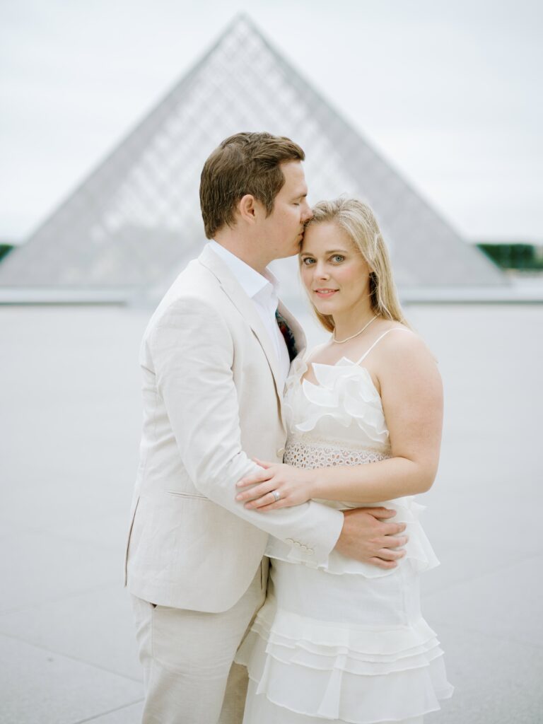 Luxury anniversary photoshoot with couple at the Louvre Paris