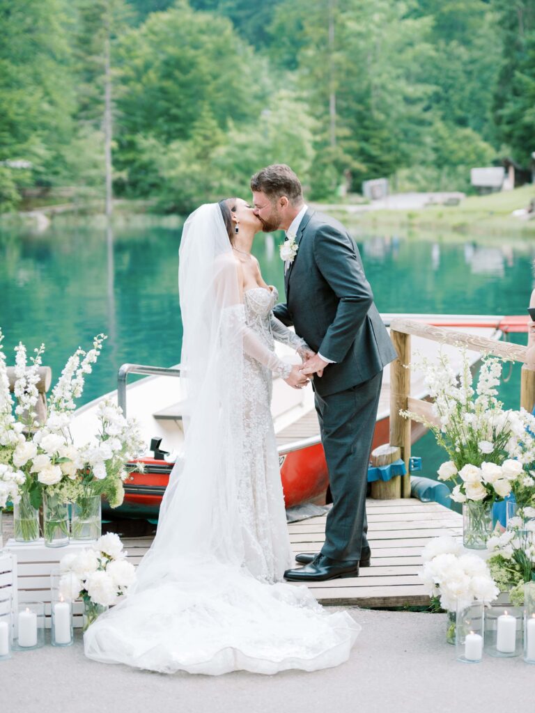 Newlyweds sharing a kiss after deciding to elope in Switzerland